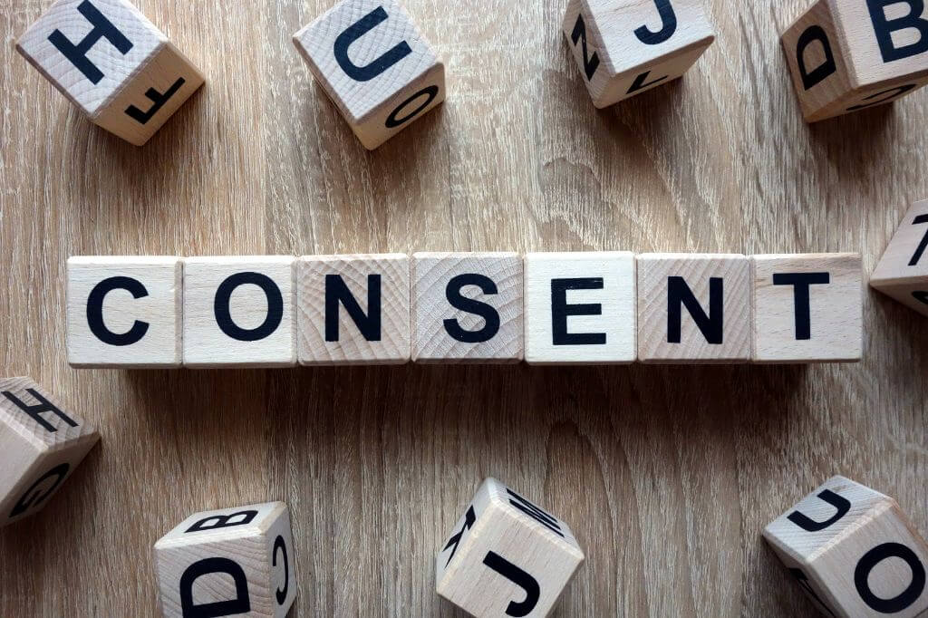 Lettered cubes spelling out the word "Consent"